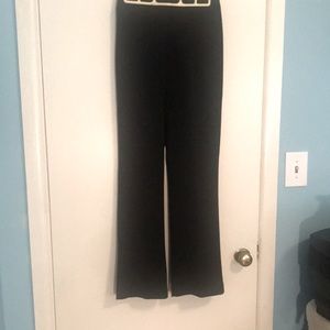 Bebe boot cut black pants. Front pockets. Size 2